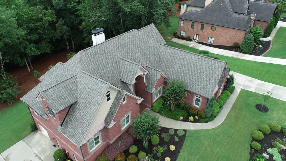 Slide of ProsTouch Roofing