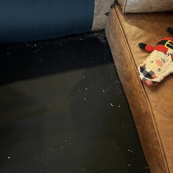 Eco Mama Green Clean  - debris under the couch cushion - Home Cleaning Near Me - Phoenix, Arizona