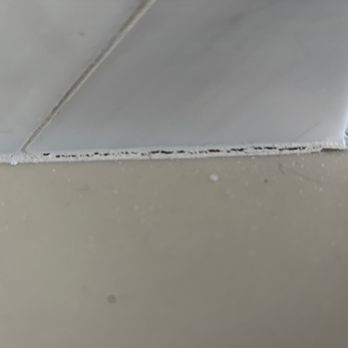 D-Lux Construction - eroding grouting between counters and backsplash after Dean personally regrouted the backsplash because it was falling apart - Carpenters Near Me - Redondo Beach, California