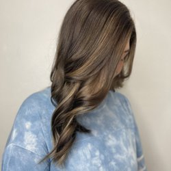 ReVamp Hair Parlour  - Balayage with root coverage and a dry haircut makes this transformation complete.
