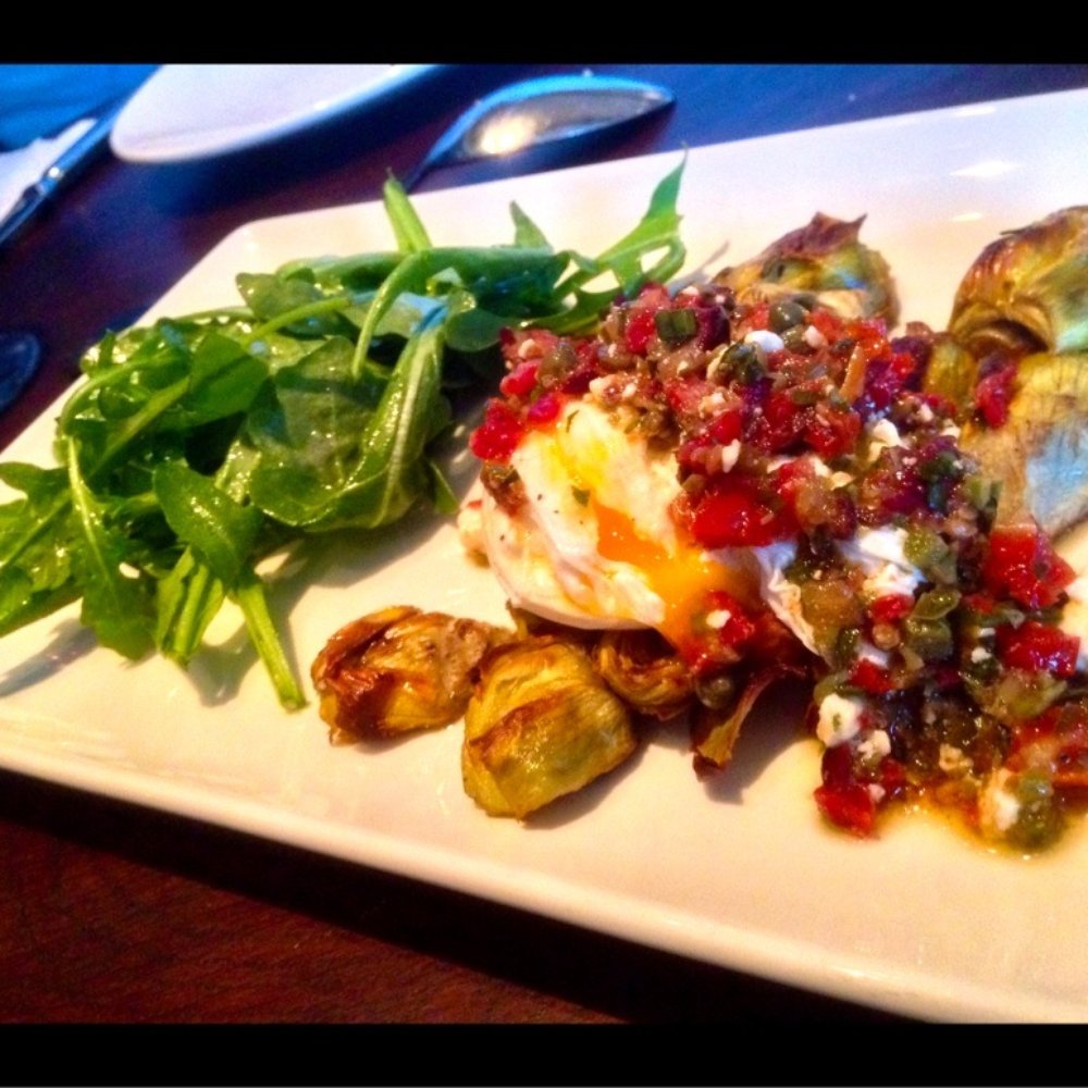 Gemma - Roasted baby artichokes with a poached egg, olives, tomatoes and arugula. No complaints! - French Near Me - Dallas, Texas Gemma - Roasted baby artichokes with a poached egg, olives, tomatoes and arugula. No complaints! - French Near Me - Dallas, Texas