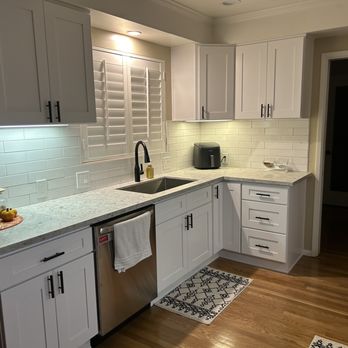 Foothill Renovators - New counter tops, subway tiles with black knobs and handles on new cabinets. - General Contractors Near Me