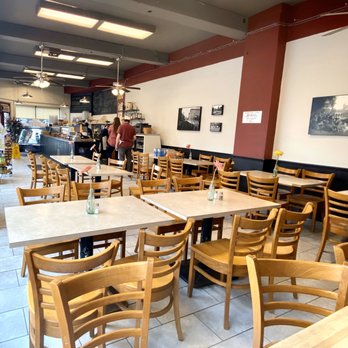 The Cornerstone - a view of a restaurant with tables and chairs - Delis Near Me - Hartford, Connecticut The Cornerstone - a view of a restaurant with tables and chairs - Delis Near Me - Hartford, Connecticut