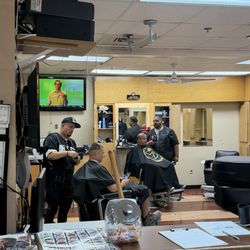 Billionaire Barber Brandon (right), and Vic The Barber (left).