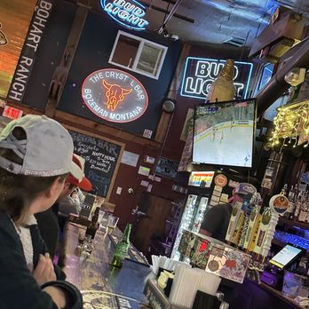 The Crystal Bar - a woman sitting at the bar - Music Venues Near Me - Bozeman, Montana