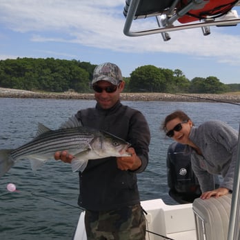 G Cove Charters - Greg taught us how to hold the fish for our photos. - Boat Charters Near Me - York, Maine