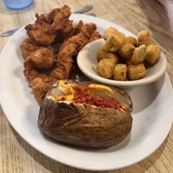 Earl G Dumplin's - Chicken strips, loaded baked potato and okra.