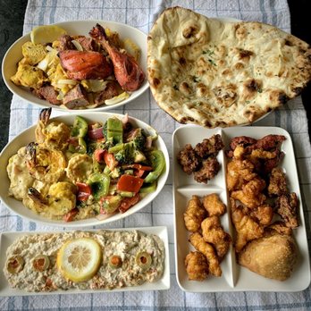 India Bistro - Tandoori Combo, seafood trio, baba ghannoj, naan and mixed appetizer. Not pictured a ton of rice that comes with ~ IG: @seattle.food.diva - Indian Near Me - Seattle, Washington India Bistro - Tandoori Combo, seafood trio, baba ghannoj, naan and mixed appetizer. Not pictured a ton of rice that comes with ~ IG: @seattle.food.diva - Indian Near Me - Seattle, Washington