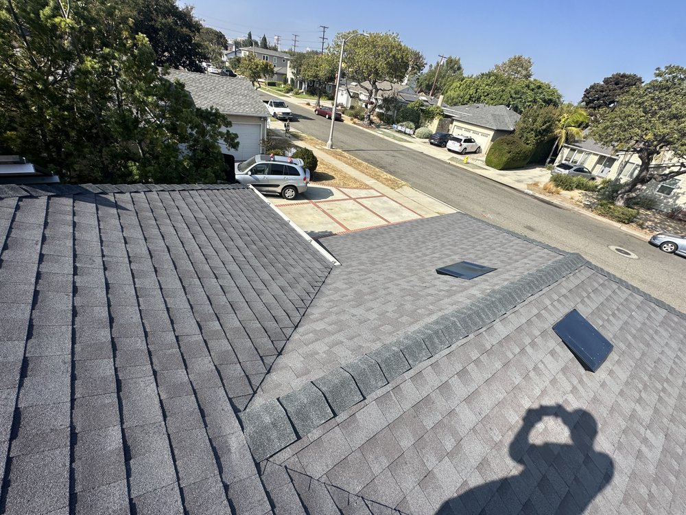 Slide of Rod's Roofing