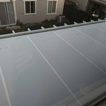 Bright Ideas Design Center - View from second floor of house of the roof of patio. - Patio Coverings Near Me