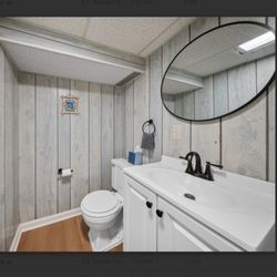 Jim Peterson Plumbing - New basement bathroom vanity and plumbing.