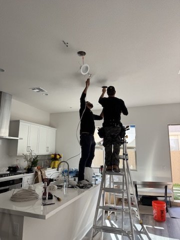 Slide of OC Electricians, by Osta