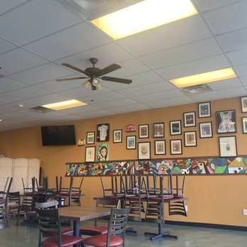 Salvadoreño Restaurant - a dining area with tables and chairs - Salvadoran Near Me - Phoenix, Arizona Salvadoreño Restaurant - a dining area with tables and chairs - Salvadoran Near Me - Phoenix, Arizona