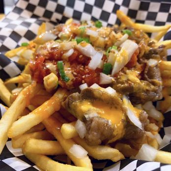 Tiger Bites - Tiger Fries loaded with kalbi beef, kimchi, green onion, onion, white sesame, sweet & spicy mayo - Taiwanese Near Me - Bellevue, Washington Tiger Bites - Tiger Fries loaded with kalbi beef, kimchi, green onion, onion, white sesame, sweet & spicy mayo - Taiwanese Near Me - Bellevue, Washington