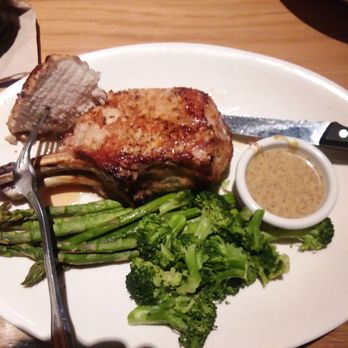 BJ's Restaurant & Brewhouse - Grilled double bone in pork chop. Yum, yum - Breweries Near Me - Mobile, Alabama