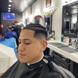 Golden Touch Barbershop - Fade with braids