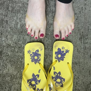 La Belle Nail Lounge - The gross new flip flops they gave me when my nails had not dried in over 30 minutes stained my feet. - Waxing Near Me - Santa Rosa, California La Belle Nail Lounge - The gross new flip flops they gave me when my nails had not dried in over 30 minutes stained my feet. - Waxing Near Me - Santa Rosa, California