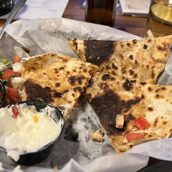 Hungry Buffalo - Burned chicken quesadilla. - New American Near Me - Logan, Ohio