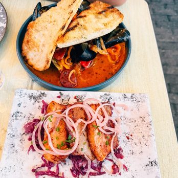 BARCA Pier & Wine Bar - CRISPY PORK BELLY PORCHETTA and CATALAN STYLE MUSSELS - Mediterranean Near Me - Alexandria, Virginia