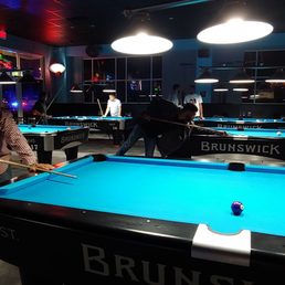 people playing pool people playing pool
