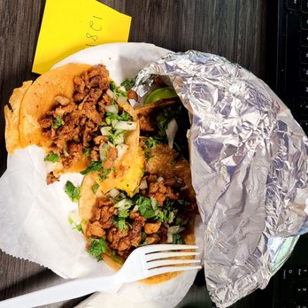 Chavo's Tacos - Al pastor street tacos with pineapple slice and delight salsa verde. - Caterers Near Me - Detroit, Michigan