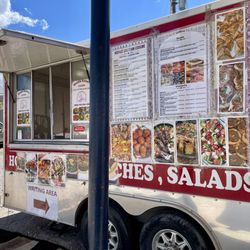 Middle Eastern Cuisine - Outside of food truck with menu and photos.