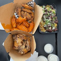 NGHBRS Kitchen - Garlic Parmesan, Cajun lemon pepper and buffalo wings with a side of Tri tip garlic noodles