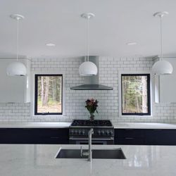 Seakill - Modern kitchen with hand laid subway tiles