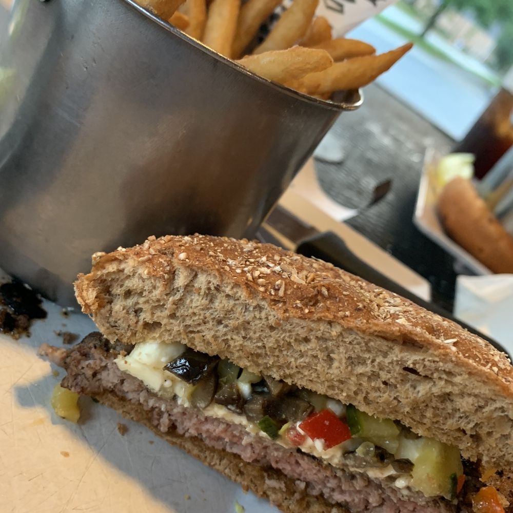 Burger Tavern 77 - Greek burger, jo jo fries. - Burgers Near Me - Columbia, South Carolina Burger Tavern 77 - Greek burger, jo jo fries. - Burgers Near Me - Columbia, South Carolina