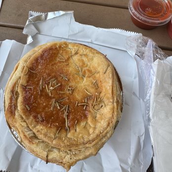The Kookaburra - Egg/cheese Aussie pie with sriracha - Coffee & Tea Near Me - St. Augustine Beach, Florida
