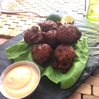 Sol by the Sea - Spicy conch fritters- beautiful presentation - Caribbean Near Me - Key Largo, Florida Sol by the Sea - Spicy conch fritters- beautiful presentation - Caribbean Near Me - Key Largo, Florida