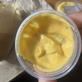 Taco Bell - Chips and Nacho Cheese Sauce (half empty). - Fast Food Near Me - New York, New York Taco Bell - Chips and Nacho Cheese Sauce (half empty). - Fast Food Near Me - New York, New York