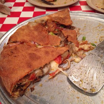 Carmelo's - Now I know why they call this a Supreme Stuffed Carmelo pizza. Boy I'm stuffed! - Pizza Near Me - St. Augustine, Florida