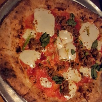 Barbuzzo - CINGHIALE Cinghaile Pizza (san marzanos, smoked fior di latte, marinated ramps, pickled chiles, house made wild boar sausage, basil) - Mediterranean Near Me - Philadelphia, Pennsylvania