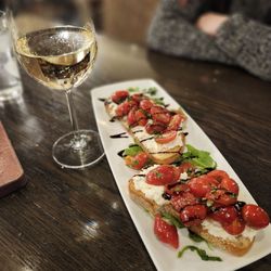Cooper’s Hawk Winery & Restaurant - Bruschetta with my Yelper-in-training