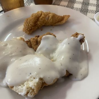 Division Street Diner - Top is catfish ( excellent) bottom is chicken fried steak is really along with the gravy and when you pay they dessert of different things - Diners Near Me - Arlington, Texas