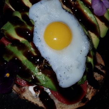 Hollow Spirits Distillery - 1/11/2019 avocado toast topped with a fried quail egg view one - Beer, Wine & Spirits Near Me - Albuquerque, New Mexico Hollow Spirits Distillery - 1/11/2019 avocado toast topped with a fried quail egg view one - Beer, Wine & Spirits Near Me - Albuquerque, New Mexico