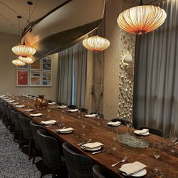Fish Shop - The private dining room, with a giant canoe hanging above.
