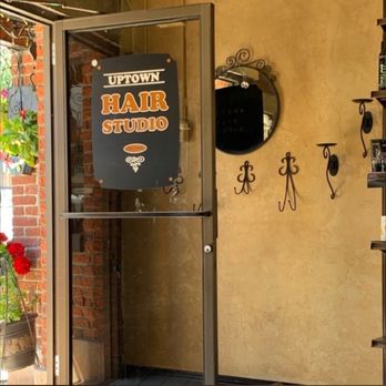 Therapeutic Flow Massage - The front door with the sign for Uptown Hair Studio - Massage Therapy Near Me - Kellogg, Idaho