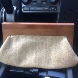 Shimmery gold cloth clutch with wooden handle Shimmery gold cloth clutch with wooden handle