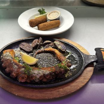 The Fish House - Grilled octopus and purple fingerling potatoes - Seafood Near Me - Miami, Florida The Fish House - Grilled octopus and purple fingerling potatoes - Seafood Near Me - Miami, Florida