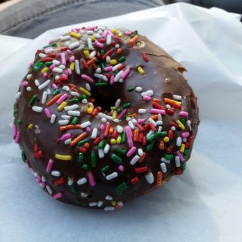 Moon Donuts - Regular donut with chocolate icing and rainbow sprinkles. Damn fine donut!  One of the best I have ever had! - Donuts Near Me - Redondo Beach, California