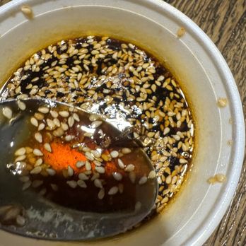 Chinese On the Go - a spoon in a bowl of soup - Chinese Near Me - Bryant, Arkansas Chinese On the Go - a spoon in a bowl of soup - Chinese Near Me - Bryant, Arkansas
