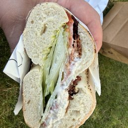 This is their "Bagel Club" chicken salad, lettuce tomato and bacon. 15 dollars for lots lettuce and little chicken salad. This is their "Bagel Club" chicken salad, lettuce tomato and bacon. 15 dollars for lots lettuce and little chicken salad.