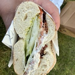 This is their "Bagel Club" chicken salad, lettuce tomato and bacon. 15 dollars for lots lettuce and little chicken salad.