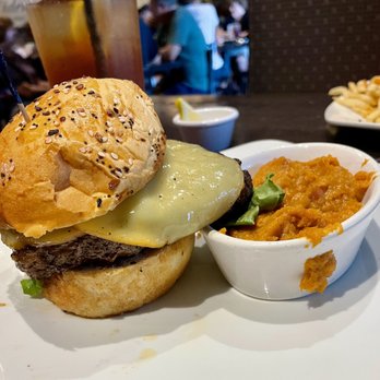 Local Goat - American Burger and Sweet Potato Mash. Excellent!! Local beef and they make their own buns daily! - New American Near Me - Pigeon Forge, Tennessee Local Goat - American Burger and Sweet Potato Mash. Excellent!! Local beef and they make their own buns daily! - New American Near Me - Pigeon Forge, Tennessee