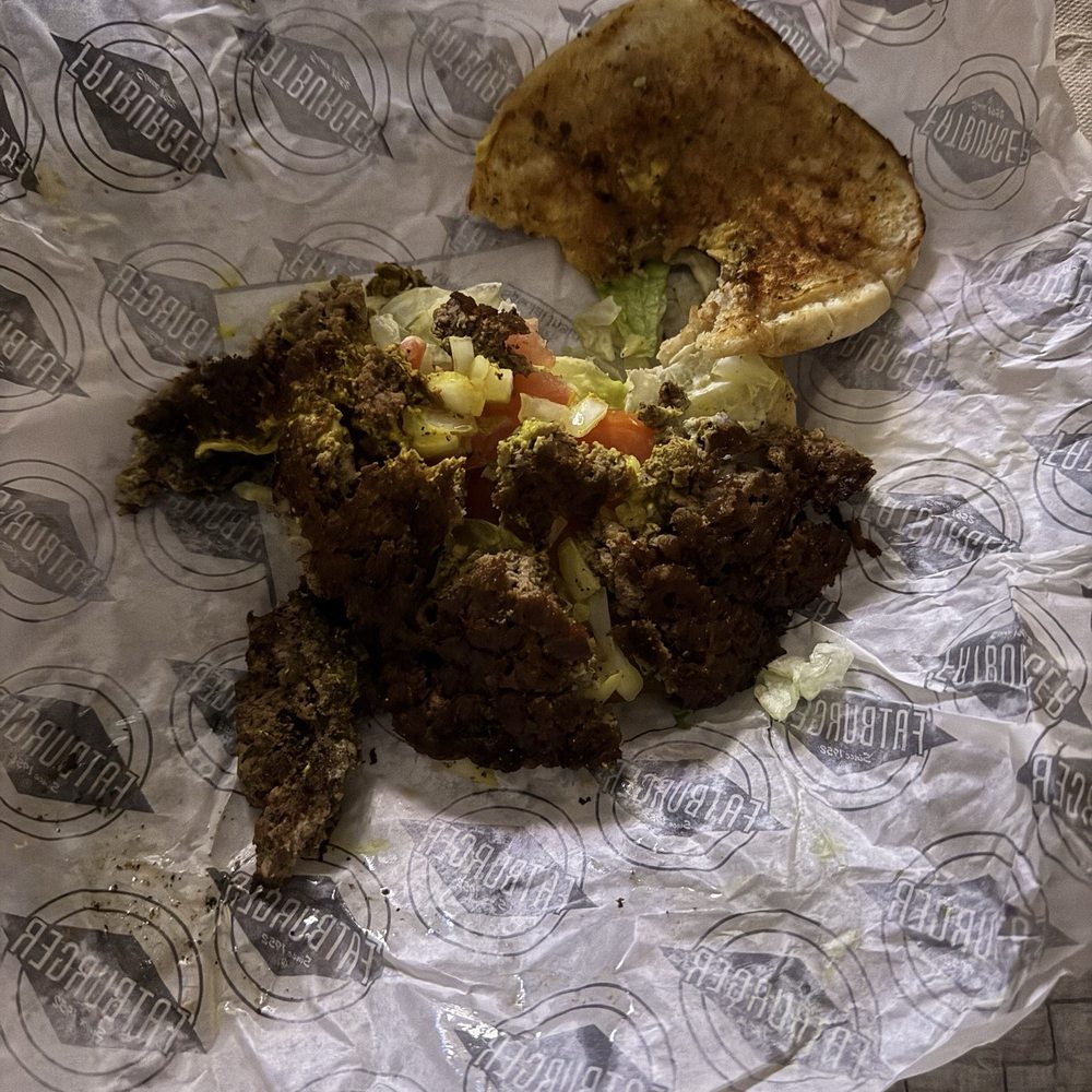 Fatburger - This was my Large Fatburger (1/2 lb.) Meal after 2 bites - meat crumbles - Burgers Near Me - Los Angeles, California Fatburger - This was my Large Fatburger (1/2 lb.) Meal after 2 bites - meat crumbles - Burgers Near Me - Los Angeles, California