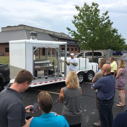Guys Who Clean - Alex shows off the power washing rig to his local BNI chapter