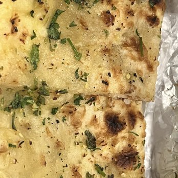 Indian Sizzle - 5. Garlic Naan - Indian Near Me - Sacramento, California Indian Sizzle - 5. Garlic Naan - Indian Near Me - Sacramento, California