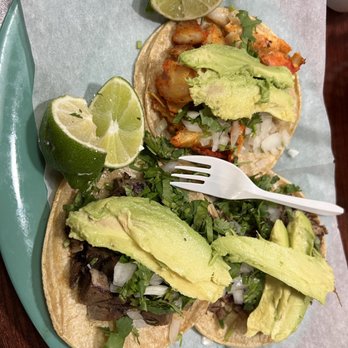 El Tsunami - two tacos on a plate with a fork - Mexican Near Me - Milwaukee, Wisconsin